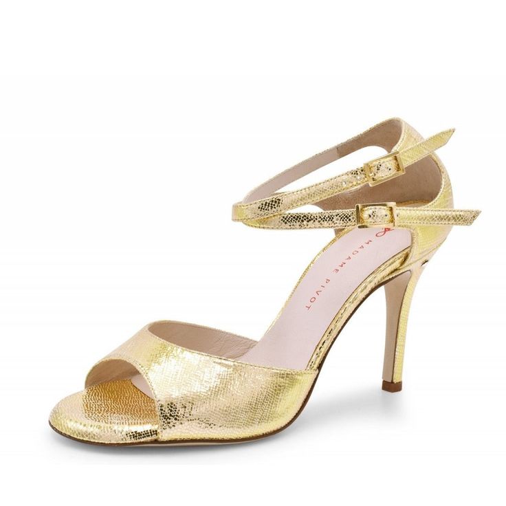 Lovely bright platinum gold embossed leather, fabulously elegant, neutral yet a show stopping design! The double ankle strap with closed back keeps your foot securely in the shoe at all times, from red carpets to dance floors. You can wear the ankle straps crossed or parallel, as the mood strikes you. This sandal beautifully supports your foot with the single toe band. The shoe is finished with a subtle signature brilliant adornment on the left heel. With a soft memory foam foot bed padding, you Bed Padding, Tango Shoes, Dance Floors, Street Shoes, Shoe Bags, Red Carpets, Foot Bed, Florence Italy, Toe Designs