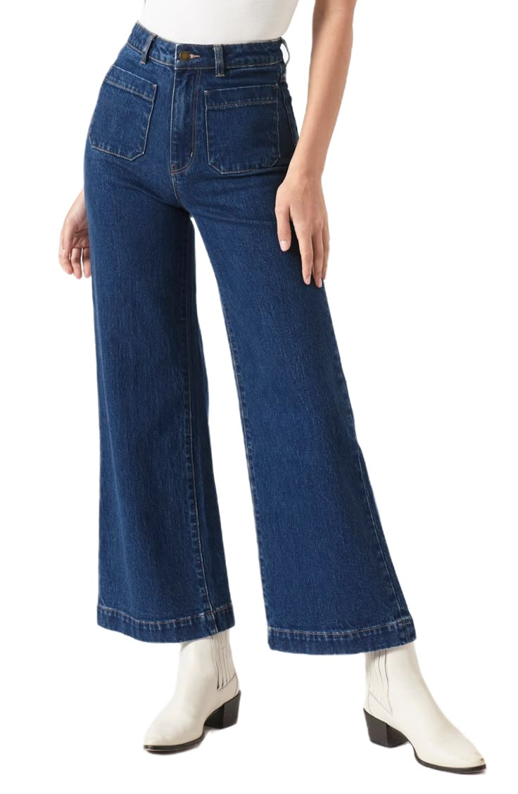 Fall for the silhouette of these high-waist jeans made from stretch-kissed denim in a light-blue wash with retro patch pockets and wide ankle-grazing hems. 28" inseam; 23" leg opening; 12 1/2" front rise; 14 1/2" back rise (size 29) Zip fly with button closure Five-pocket style 99% cotton, 1% elastane Machine wash, line dry Imported