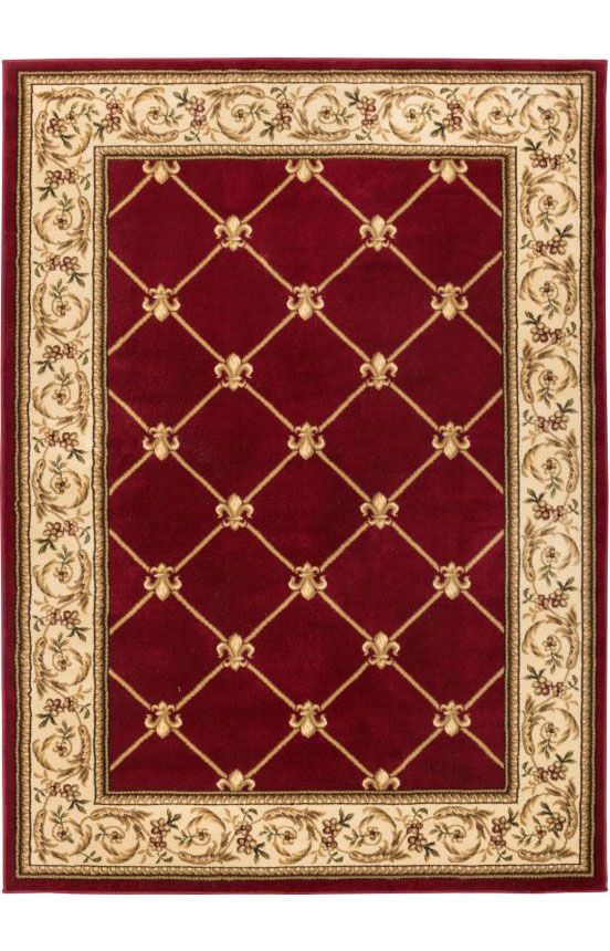 a red rug with white and gold accents