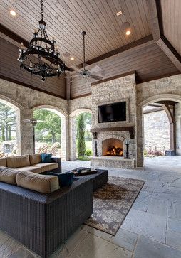 a living room with couches and a fireplace