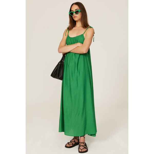 Green viscose (82% EcoVero Viscose Shell, 18% Nylon). Lining (100 % Ecovero Viscose). Shift. V-neck. Sleeveless. Tie closure. 47" from shoulder to hemline. Imported. Chic V-neck Maxi Dress For Daytime, Rayon Midi Sundress For Daywear, Summer Midi Dress In Viscose For Day Out, Summer Viscose Midi Dress For Day Out, Casual Summer Viscose Maxi Dress, Rayon Midi Length Sundress For Daywear, Sleeveless Dress With Adjustable Straps For Daywear, V-neck Maxi Dress For Daytime, Casual Maxi Length Dress With Adjustable Straps