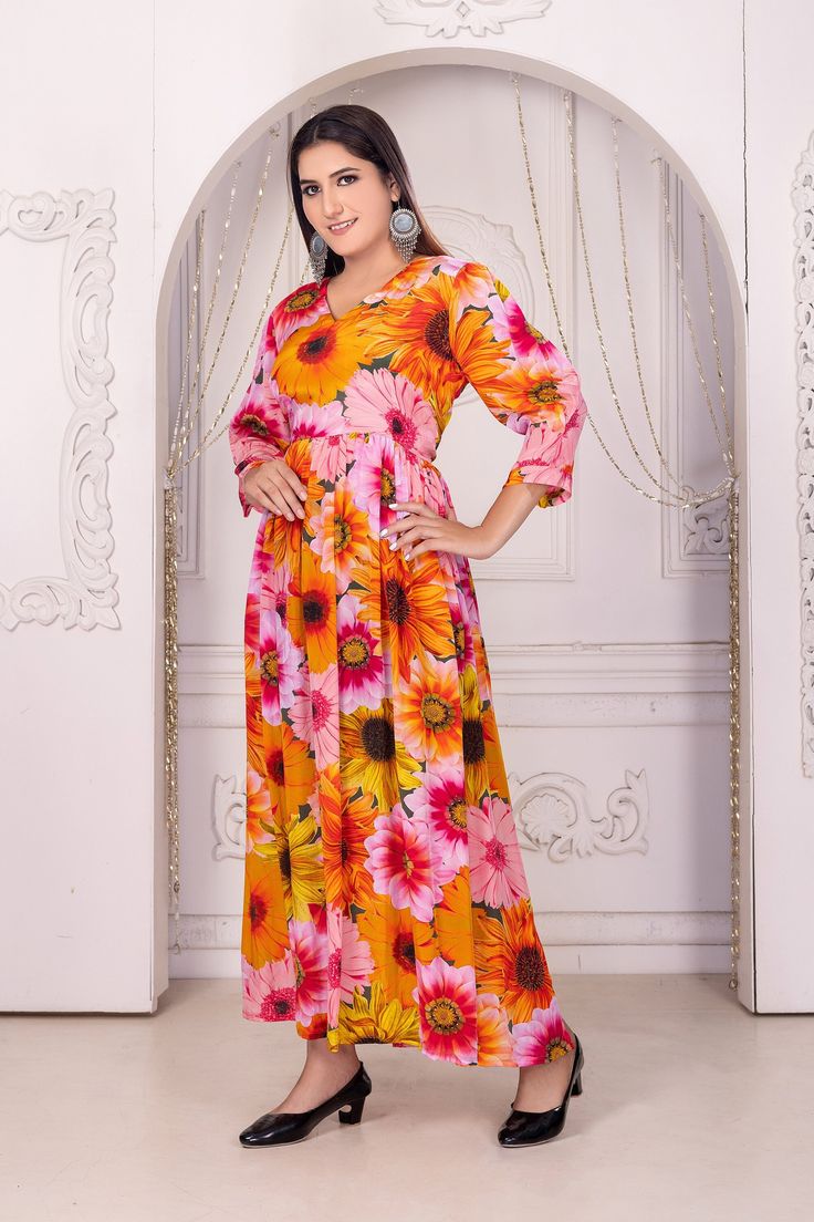 Indulge in timeless elegance with our flower print silk dress for women. Crafted from luxurious silk, this dress features a delicate floral pattern that exudes grace and sophistication. Perfect for any special occasion, it offers a flattering silhouette and a touch of feminine charm that will make you feel effortlessly beautiful. FABRIC :- 100% Silk (NON SHEER) Size :- (Medium To 2XL) * Regular Dress Length 55" from shoulder to hem CARE * Hand washing recommended * Gentle machine wash SHIPPING * Spring Silk A-line Gown, Silk Maxi Dress With Floral Print, Multicolor Silk A-line Maxi Dress, Festive A-line Silk Dress, Floral Print Silk Maxi Dress, Spring A-line Silk Gown, Elegant Multicolor Digital Print Maxi Dress, Feminine Festive Silk Dresses, Floor-length Floral Silk Maxi Dress