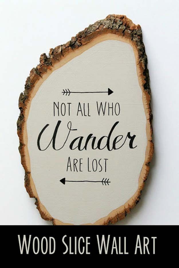 a wooden sign that says, not all who wander are lost on the side of a white wall