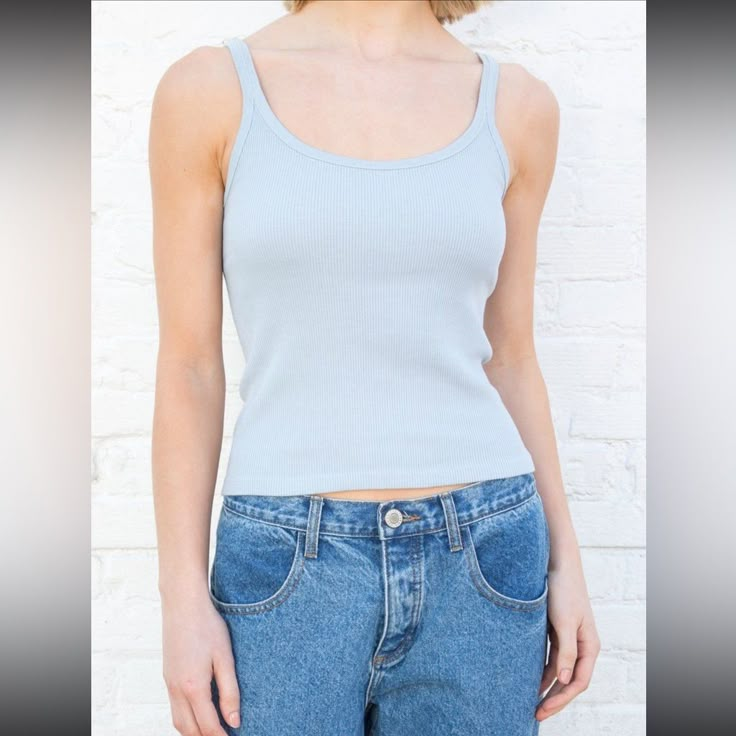 Soft Ribbed Cotton Tank With A Scoop Neck Front. Fabrics: 100% Cotton Measurement: 19" (48 Cm) Length, 14" (36 Cm) Bust Made In: Italy Fitted Light Wash Top For Everyday, Blue Summer Tank Top For Everyday Wear, Everyday Fitted Blue Tops, Casual Fitted Light Blue Tank Top, Blue Cami Top For Spring, Basic Blue Tank Top For Summer, Trendy Washed Blue Tank Top For Spring, Light Blue Fitted Tank Top For Spring, Light Blue Fitted Casual Tank Top