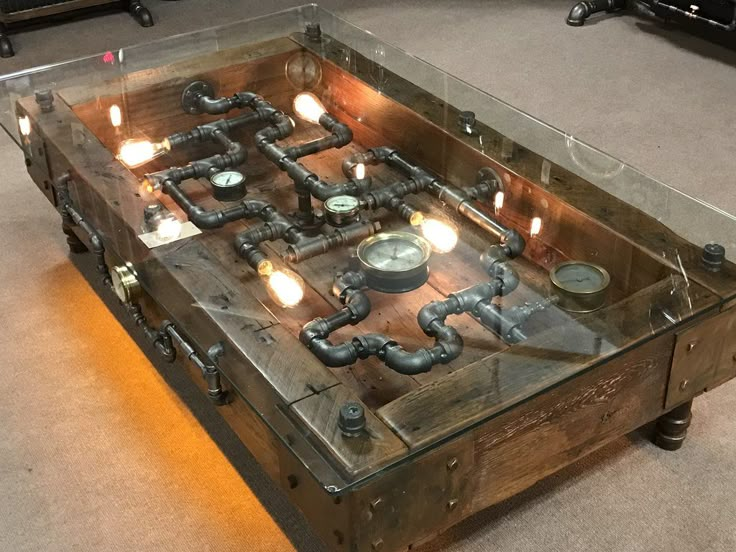 an old fashioned foo - ball table with candles on it in a living room area