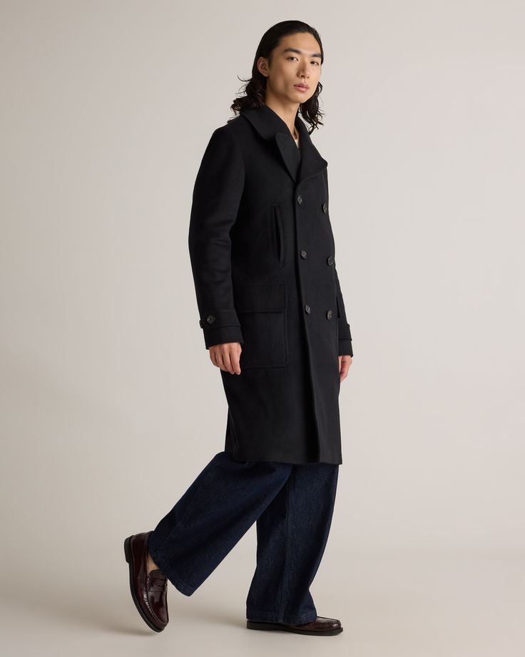 We've taken a luxe approach to the classic overcoat with this one. Our Italian Wool Double-Breasted Officer Topcoat features notched lapels, functional pockets, and a timeless double-breasted design. Made with Italian wool and made to last.  | Quince | Men's Italian Wool Double-Breasted Officer Topcoat in Black, Size Small, Wool/Nylon Timeless Outerwear With Pockets For Fall, Timeless Fall Outerwear With Pockets, Classic Double-breasted Peacoat With Pockets, Timeless Winter Outerwear With Pockets, Timeless Notch Lapel Outerwear With Buttons, Timeless Black Double-breasted Outerwear, Timeless Long Coat With Button Closure, Black Long Pea Coat With Concealed Placket, Business Outerwear With Notch Lapel And Button Closure