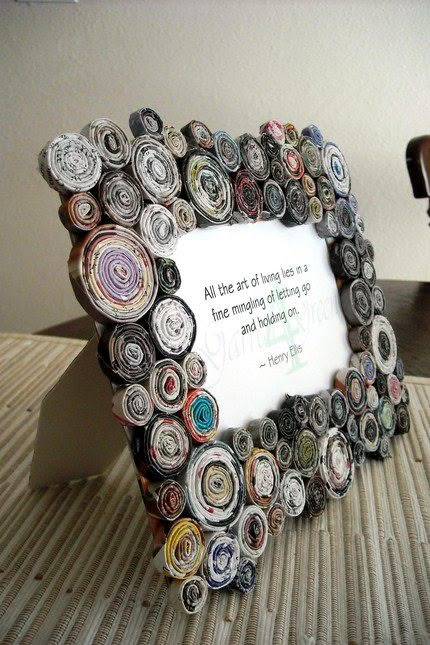 a photo frame made out of rolled up paper