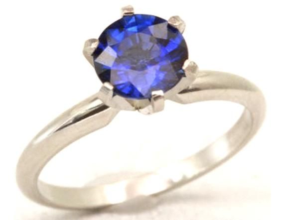 GEMSTONE DETAILS:BRAND NEW Natural Blue Sapphire Round CutAvailable in 5 different Stone Sizes 1.40CT Stone - 6.5 mm Diameter. Ring Height - 8.08 mm, Ring Width - 8.00 mm. Shank Width - 1.9mm1.70CT Stone - 7.0 mm Diameter. Ring Height - 8.56 mm, Ring Width - 8.65 mm. Shank Width - 1.9mm2.20CT Stone - 7.5 mm Diameter. Ring Height - 9.25 mm, Ring Width - 9.65 mm. Shank Width - 1.9mm2.60CT Stone - 8.0 mm Diameter. Ring Height - 9.95 mm, Ring Width - 10.65 mm. Shank Width - 1.9mm3.67CT Stone - 9.0 m Blue Sapphire Solitaire Ring For Formal Occasions, Classic Blue Solitaire Jewelry, Classic Blue Jewelry With Prong Setting, Formal Blue Sapphire Solitaire Ring, Classic Royal Blue Round Sapphire Ring, Formal Blue Sapphire Ring With Round Band, Royal Blue Round Jewelry With Center Stone, Blue Sapphire Solitaire Jewelry, Blue Solitaire Jewelry For Formal Occasions