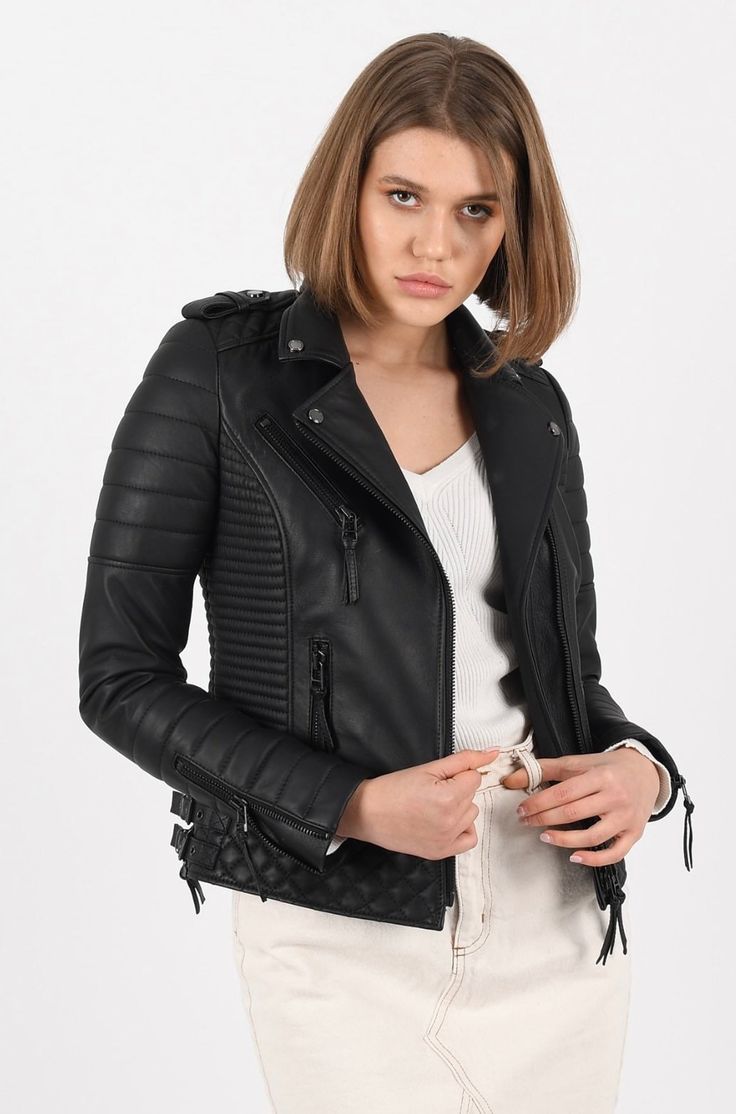 Tight fit biker style leather jacket. Double front fastening zips. Quilted detail & side buckles. Genuine Black Leather Womans Jacket 100% Lambskin Black metal zips/hardware Tight fit Quilted detail Tailored Lapels 2 Outside zipped pockets plus inside pocket which fits an iphone (zipped) Premium Lined Chic/Modern Can be worn anywhere (PLEASE CHECK OUR SIZING GUIDE BEFORE ORDERING) Long Sleeve Leather Jacket For Biker Events, Winter Biker Leather Jacket With Zipper Closure, Fitted Leather Jacket With Metal Zipper For Winter, Long Sleeve Biker Jacket With Zipper For Biker Events, Fitted Winter Biker Jacket With Metal Zipper, Fitted Biker Jacket With Metal Zipper For Winter, Punk Leather Jacket With Zipper For Winter, Leather Biker Jacket With Metal Zipper, Black Biker Leather Jacket With Metal Zipper