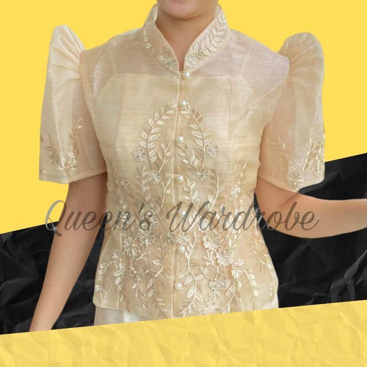 Elevate your fashion game with our exquisite Filipiniana collection, perfect for special occasions and cultural events. Shop now! ✨ Fabric: Organza with 3D Lace Imelda Sleeves Chinese Collar Note: We are going to ship from Philippines and our courier is DHL, the Contact number of the receiver is required. so please send us your contact number after you check out. Thank you so much 🫶💌 Floral Embroidered Brocade Sets, Organza Blouse For Wedding And Eid Festival, Embroidered Fitted Set With Short Sleeves, Fitted Embroidered Short Sleeve Sets, Embroidered Fitted Short Sleeve Sets, Wedding Eid Organza Blouse, Elegant Beige Sets With Gold Embroidery, Elegant Organza Blouse Piece, Elegant Beige Traditional Wear With Floral Embroidery