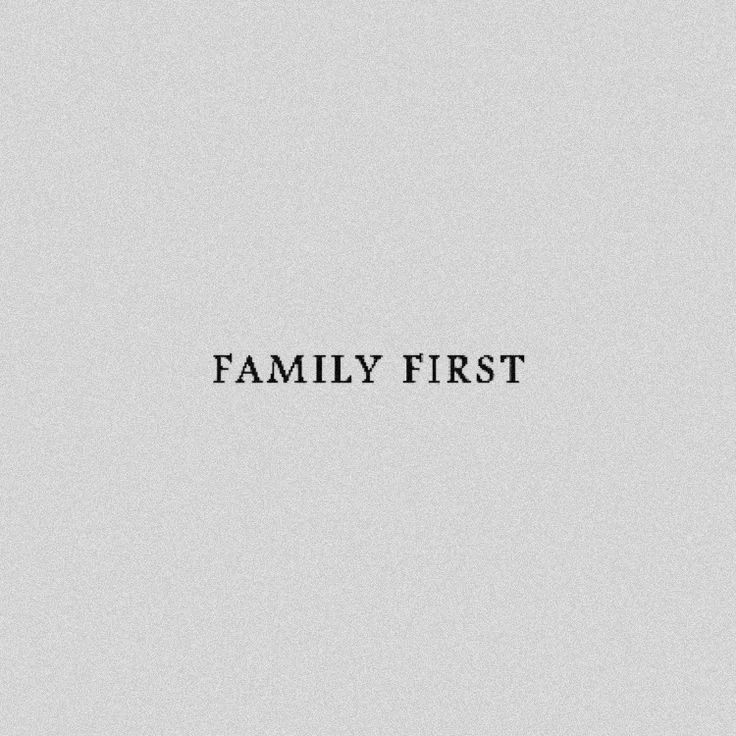 a black and white photo with the words family first