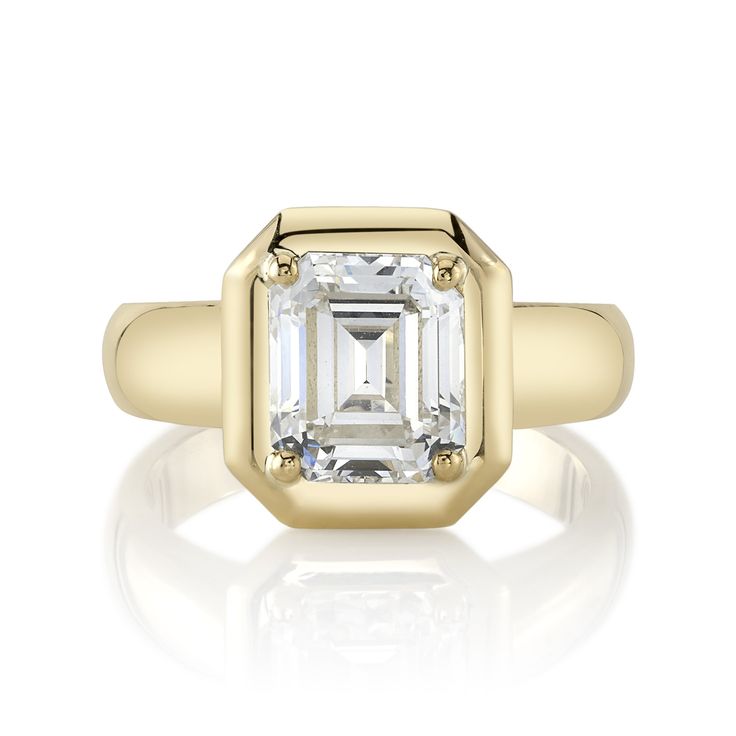 2.35ct L/VS1 GIA certified Emerald cut diamond prong set in a handcrafted 18K yellow gold mounting. Ring is currently a size 6 and can be sized to fit. Stone Certificate 2.35ct L/VS1 Timeless Octagon Diamond Ring With Center Stone, Timeless Moissanite Octagon Diamond Ring, Timeless Octagon Moissanite Diamond Ring, Yellow Gold Octagon Diamond Ring With Center Stone, Classic Octagon Moissanite Ring, Octagon Yellow Gold Diamond Cut Ring, Yellow Gold Octagon Cut Diamond Ring, Gold Lab-grown Diamond Ring With Single Diamond, Luxury Octagon Diamond Ring With Single Cut Diamonds