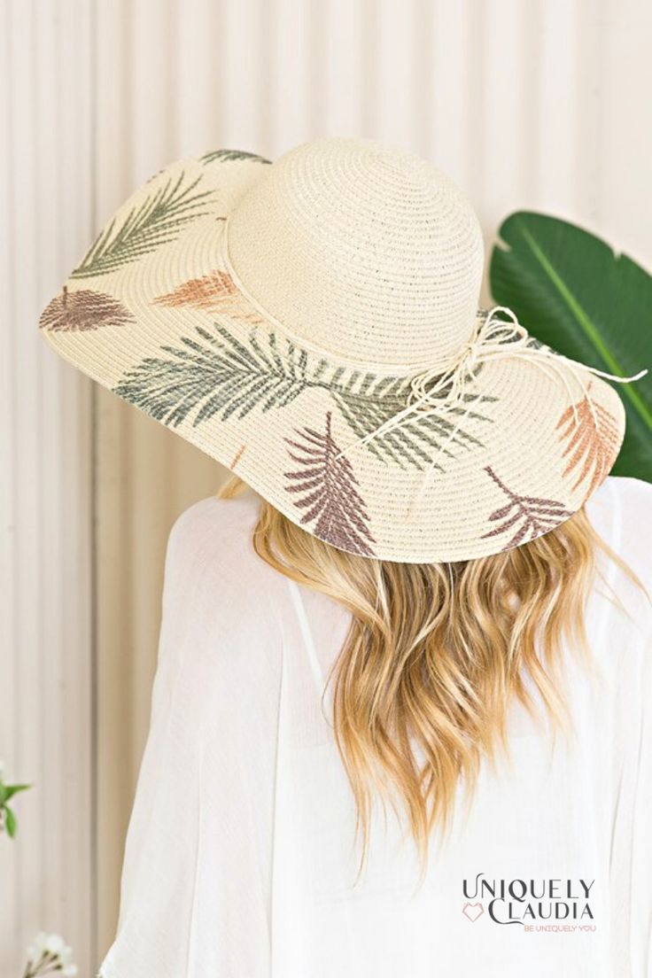 Take your vacay or weekend getaway up a notch with our Palm Beach Floppy Sun Hat! Look effortlessly sophisticated with this stunning sun hat that is composed of woven straw that shapes a high crown, a rounded top, and a wide, floppy brim (that can be shaped any way you wanna wear it!) with a knotted bow accent at the band. 6" brim. 22.5" interior circumference with an adjustable internal drawstring. Crown measures 4" tall 100% Paper Spot Clean Hand Made / Hand Printed Imported