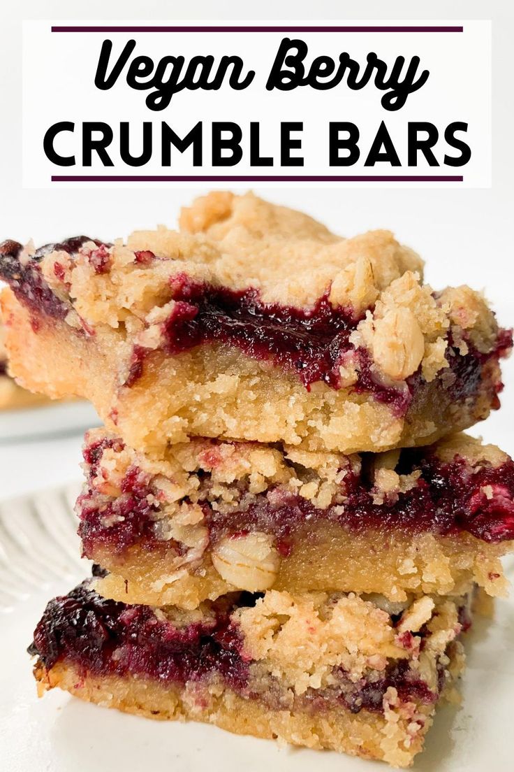 three vegan berry crumble bars stacked on top of each other with text overlay