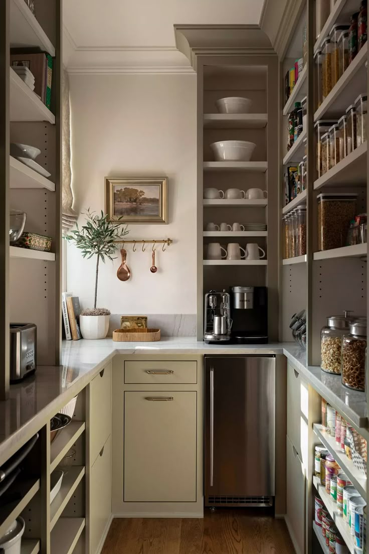 the kitchen is clean and ready to be used as a storage area for food items