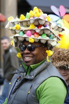 a man wearing a hat made out of eggs