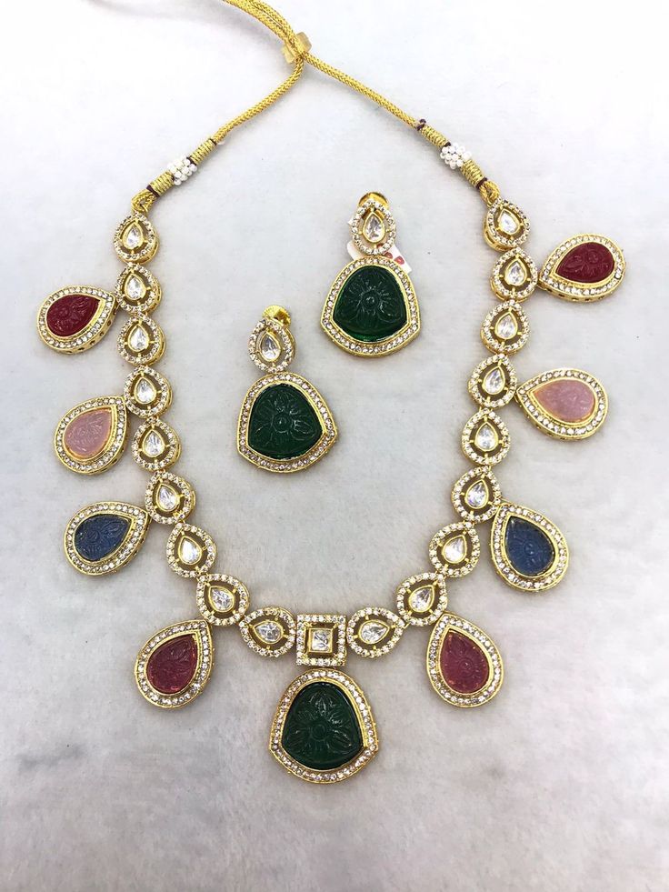 All our pieces are in stock and will be dispatched within 24 to 48 hours of order. Orders received during the weekend will be dispatched on Monday One of our favorite picks for the wedding season or festival season 2022❤️ Comes with an adjustable string Material: Brass and copper mix, gold polish, cz stones, polki Kundan, carved Quartz stones Elegant Multi-stone Kundan Necklace For Festive Occasions, Fusion Style Multicolor Bridal Necklace With Intricate Design, Elegant Festive Multi-stone Jewelry Sets, Multicolor Fusion Bridal Necklace With Intricate Design, Elegant Multi-stone Bridal Necklace For Festive Occasion, Elegant Multi-stone Bridal Necklace For Festivities, Elegant Festive Multi-stone Bridal Necklace, Elegant Multicolor Kundan Necklace For Celebrations, Elegant Multicolor Kundan Necklace