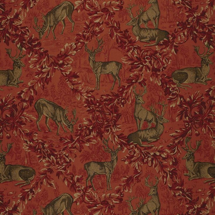 a red and brown wallpaper with deers on the leaves in an ornate pattern