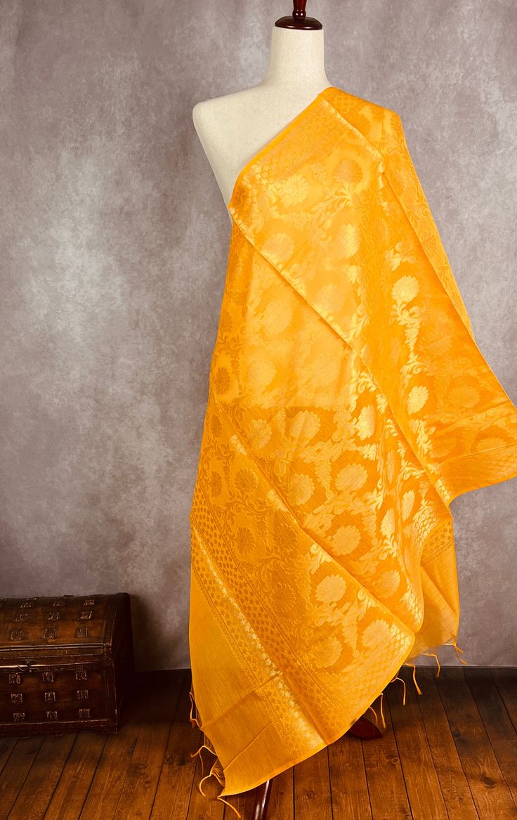 Stunning Banarasi Dupatta in Green Color with Muted Zari Weaving. Floral Design in Jaal with tassles. Give your Outfit a new look with these beauties. ❤️ Item: DupattaBase color : Turmeric YellowFabric : Soft Semi Silk (Not Pure Silk)Work : Zari Weaved with tasselsLength of the Dupatta : 92 inches approx.Width of the dupatta : 35 inches (Approx.)Store Policies- No return or exchange will be accepted for color variations.- No return or exchange will be accepted if the color does not match your ot Elegant Yellow Dupatta With Pallu, Gold Art Silk Dupatta With Woven Motifs, Gold Dupatta With Woven Motifs For Festivals, Gold Chanderi Dupatta With Woven Motifs, Gold Dupatta With Woven Motifs For Diwali, Yellow Handloom Dupatta For Wedding, Elegant Gold Traditional Wear With Woven Motifs, Wedding Yellow Handloom Dupatta, Yellow Chanderi Traditional Wear With Woven Motifs