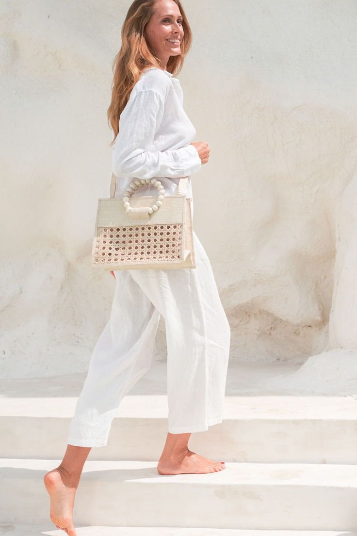 Say hello to sunshine and say goodbye to dull accessories! Our cream woven straw statement summer tote is not just a bag, it's your fashion statement! With its chic, cream color and timeless style, it's perfect for beach days, shopping trips, or simply carrying life's essentials. It's more than just a bag, it's your style story. Make this summer your best style story yet. Shop now and let your tote do the talking! Woven Bags Boho, Coachella Bag, Vacation Purse, Vacation Tote Bag, Beach Wedding Accessories, Desert Festival, Vacation Jewelry, Handwoven Bag, Wedding Handbag