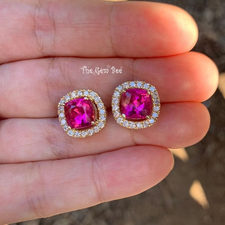 Thank you for coming in! 14k solid yellow gold earrings/ear studs with two stunningly beautiful 4.86CT pink tourmalines and 0.73ct natural diamond accents! You will receive the earrings you see in the photos! WEIGHT: 4.97 grams (4.86ct tourmaline, 0.73ct diamond) DIMENSION: 12.5mm (7.5mm tourmaline) MATERIAL: 14k solid yellow gold, Pink Rubellite Tourmaline, natural diamonds Elegant Pink Ruby Gemstones, Pink Oval Ruby Earrings, Formal Pink Gold Gemstone Earrings, Fine Jewelry With Pink Gold And Ruby, Pink Gold Ruby Fine Jewelry, Gold Gemstones With Halo Setting As Gift, Formal 14k Gold Earrings With Ethical Gemstones, 14k Gold Earrings With Gemstone Accents For Weddings, Formal Pink Gold Jewelry With Prong Setting