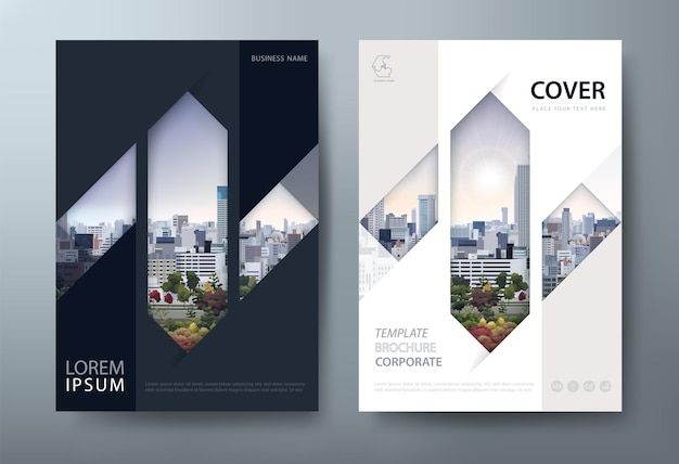 a set of two vertical brochures with cityscape in the back and side