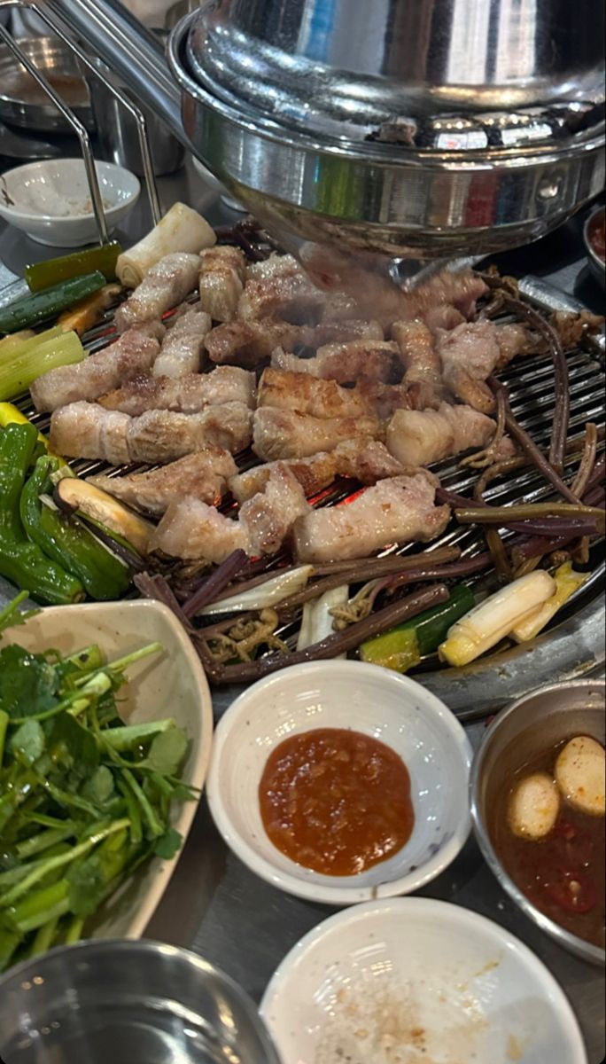 the food is prepared and ready to be eaten at the buffet table for people to eat