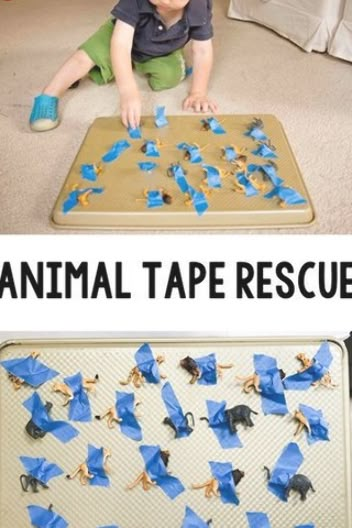 a boy playing with blue tape on the floor and an animal tape rescue mat in front of him