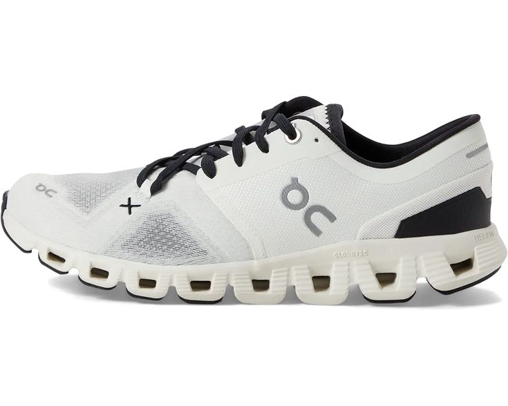 the on cloud running shoe is white and black