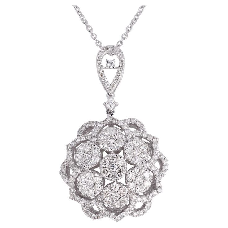 A real 1.80-carat pave diamond floral design pendant necklace, meticulously crafted in 18-karat white gold. The pendant delicately hangs from an 18-karat white gold chain. Item Code :- CNF-22029 Gross Wt. :- 4.79 gm 18k Solid White Gold Wt. :- 4.43 gm Natural Diamond Wt. :- 1.80 Ct. ( AVERAGE DIAMOND CLARITY SI1-SI2 & COLOR H-I ) Pendant Size :- 37.45 x 23.02 mm approx. Necklace Size :-17 inches Long ✦ Sizing ..................... We can adjust most items to fit your sizing preferences. Most ite Long Diamond Necklace, Floral Pendant Necklace, White Gold Chain, White Gold Chains, Floral Pendant, Necklace Size, Diamond Pendant Necklace, Necklace Sizes, Diamond Clarity