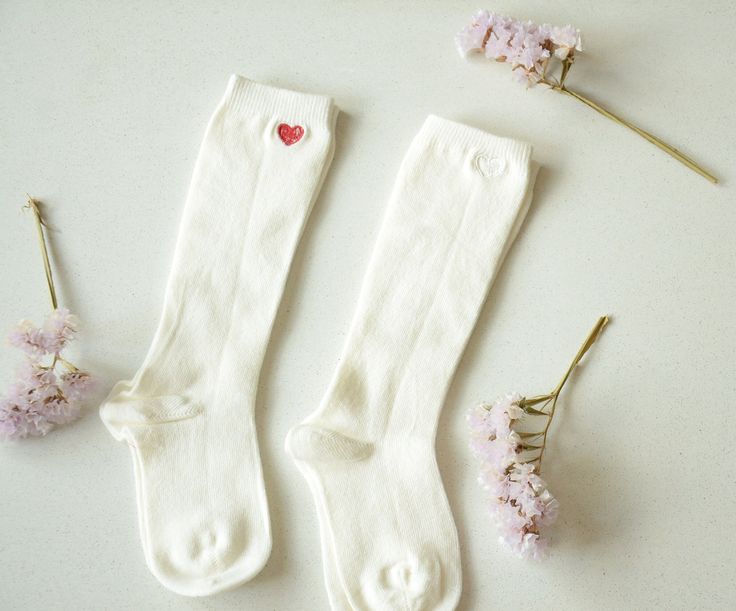 Long white kids socks with embroidered heart! Can it be any cuter?  Made from soft cotton, these knee-high socks feature adorable custom embroidery, perfect for adding a touch of elegance to any baby's wardrobe. Comfortable and stylish, these socks are ideal for everyday wear or special occasions. Color of the socks: White Size: 8-10, for feet of around 14-16 сm (5.5' - 6.2') Color of the embroidery: 10 colors available, you can see them in the pictures above ❤ SHIPPING *Please make sure your sh Playful Fitted Cotton Socks, Cotton Socks For Spring Gift, Spring Cotton Socks Gift, Playful Fitted White Socks, Playful Soft White Socks, Spring Gift Cotton Socks, Soft White Spring Socks, White Fitted Cotton Knee-high Socks, Fitted White Cotton Knee-high Socks