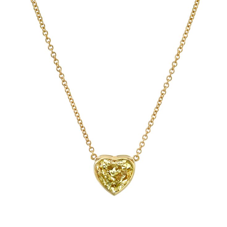 Drape yourself in luxury with our Certified 18k Yellow Gold Heart Shape Yellow Diamond Pendant. This exquisite piece features a captivating yellow diamond meticulously crafted into a heart shape, symbolizing love and opulence. Set in radiant 18k yellow gold, the pendant adds a touch of warmth and sophistication to any ensemble. The diamond is certified for its exceptional quality, ensuring enduring beauty. Luxury Yellow Gold Heart-shaped Diamond Necklace, Yellow Heart Cut Fine Jewelry, Heart Shaped Yellow Jewelry For Wedding, Heart-shaped Yellow Jewelry For Weddings, Luxury Yellow Necklaces For Anniversary, 14k Gold Heart-shaped Yellow Jewelry, Yellow 14k Gold Heart Jewelry, Heart-shaped 14k Yellow Gold Jewelry, Yellow Gold Heart Necklace With Brilliant Cut Pendant