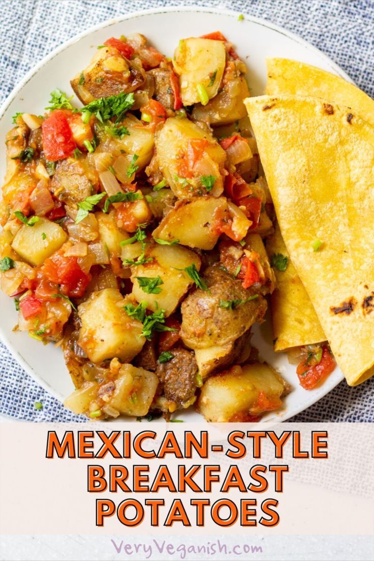 mexican style breakfast potatoes on a white plate with a tortilla in the background