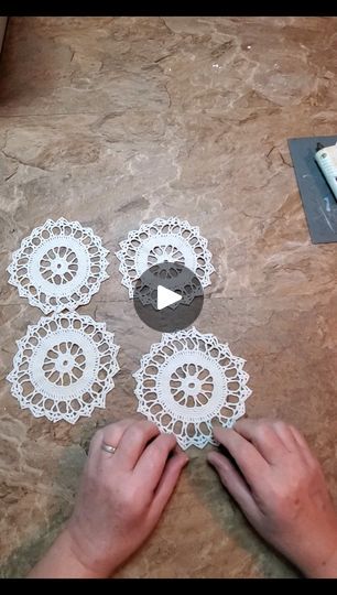 someone is making doily out of crochet