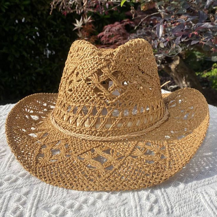 Style and sun protection go hand in hand with our Lafite Grass Edge Straw Fedora Hats. Keep cool and stylish with the sun-shielding brim while the Lafite grass edge adds a unique touch. Perfect for any sunny day outing! Country Style Sun Hat For Spring Vacation, Western Style Sun Hat For Spring Vacation, Western Sun Hat For Spring Vacation, Western Style Sun Hat With Upf 50+ For Summer, Western Sun Hat With Upf 50+ For Summer, Beige Wide Brim Crochet Hat For Outdoor, Natural Colored Sun Hat For Spring Rodeo, Natural Sun Hat For Rodeo In Spring, Natural Color Sun Hat For Rodeo In Spring