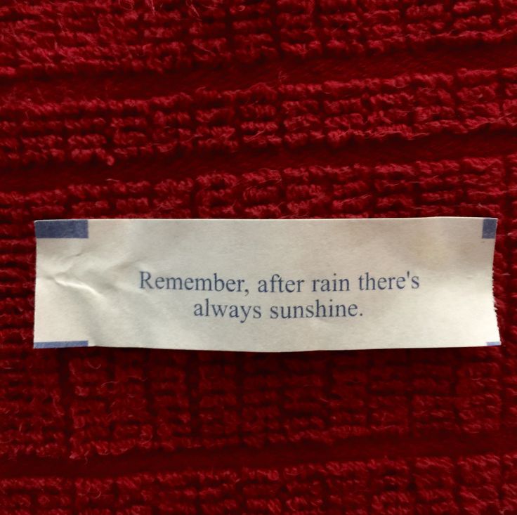 a label on a red towel that says, remember after rain there's always sunshine