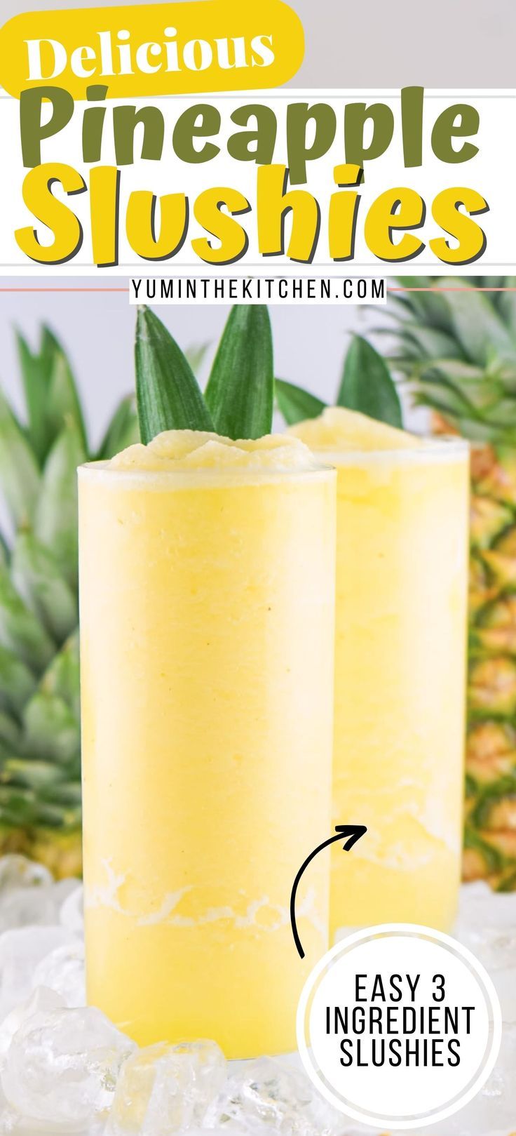 two glasses filled with pineapple slushies sitting on top of an ice block