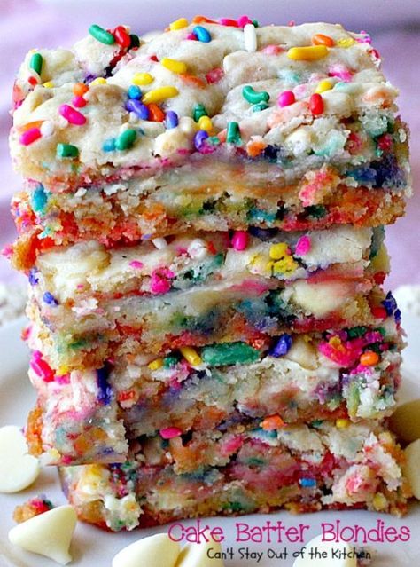 cake batter blondies stacked on top of each other with sprinkles and white chocolate chips