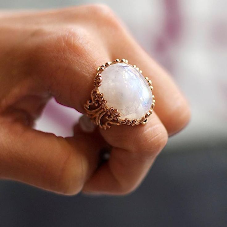 An extremely stunning moonstone on a gothic inspired rose gold cocktail ring! Spiritual Moonstone Wedding Ring With Natural Stones, Bohemian Moonstone Cabochon Ring For Wedding, Rose Gold Moonstone Ring As A Gift, Unique Moonstone Wedding Ring, Wedding Moonstone Ring, Handmade Elegant Moonstone Crystal Ring, Wedding Moonstone Ring With Natural Stones, Elegant Handmade Moonstone Crystal Ring, Handmade Rose Gold Moonstone Wedding Ring