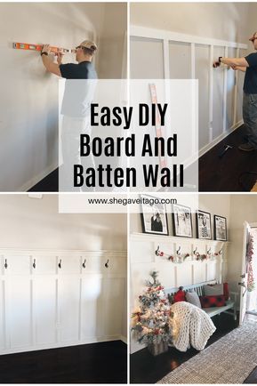 a man is painting the wall in his living room with white paint and black trim