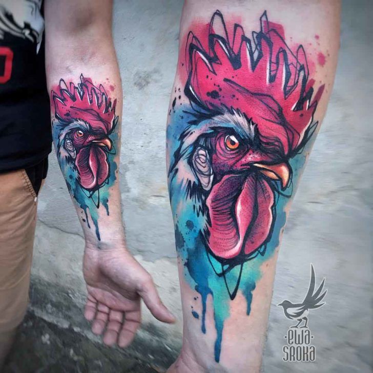 two people with tattoos on their legs holding hands and one has a rooster tattoo on it