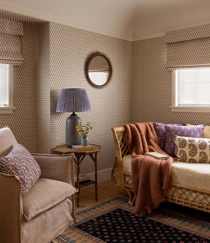 a living room filled with furniture and a lamp