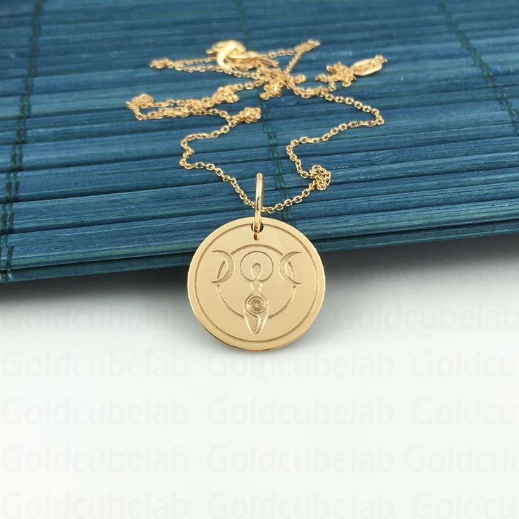 ● Material of pendant: Solid gold 14k ( REAL GOLD ) ● Metal Stamp: 14k ● The pendant is available in 3 sizes: 14,0 mm / 0,55 inches ( Diameter ) 16,5 mm / 0,65 inches ( Diameter ) 19,1 mm / 0,75 inches ( Diameter ) ( In the photos the size of the pendant is 14mm / 0.55 inches Diameter ) ● Material of chain: Solid gold 14k ( REAL GOLD ) ● Chain Options: **Chain No.1  :  thickness 0,7mm  **Chain No.2 :  thickness 1,3mm ● Chain Length: - 40 cm / 15,75 inches ( Length ) - 45 cm / 17,72 inches ( Leng Spiritual 14k Gold Medallion Jewelry, Symbolic Recycled Gold Pendant Jewelry, Spiritual 14k Gold Round Pendant Jewelry, 14k Gold Spiritual Round Pendant Jewelry, Spiritual 14k Gold Round Pendant, Spiritual 14k Gold Jewelry Stamped 14k, Mystical 14k Gold Jewelry Gift, Mystical 14k Gold Jewelry, Mystical Yellow Gold Jewelry For Gift