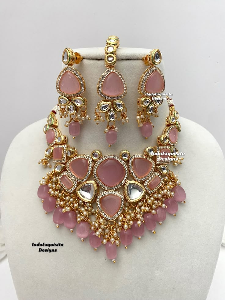 Kundan necklace/choker set comes with beautiful lightweight earrings and tikka/Kundan Polki Necklace/Reception/Wedding/bridal jewelry/ Indian jewelry /Kundan Jewelry/pink  All items are shipped from Brampton, Ontario, Canada. If you need your item by a certain day, please reach out to us for express delivery option before placing the order.  Standard shipping/delivery timeline Below are the delivery timeline estimates. We dispatch all orders by the next business day. ---> USA delivery timeline * Luxury Kundan Ornate Jewelry Sets, Luxury Kundan Jewelry Sets With Hand Set Details, Luxury Kundan Jeweled Jewelry Sets, Luxury Kundan Festive Sets, Luxury Kundan Jewelry Sets Hallmarked, Luxury Kundan Bridal Necklace With Jewels, Luxury Kundan Bridal Necklace For Women, Luxury Ornate Kundan Jewelry Sets, Luxury Kundan Bridal Sets With Tilla