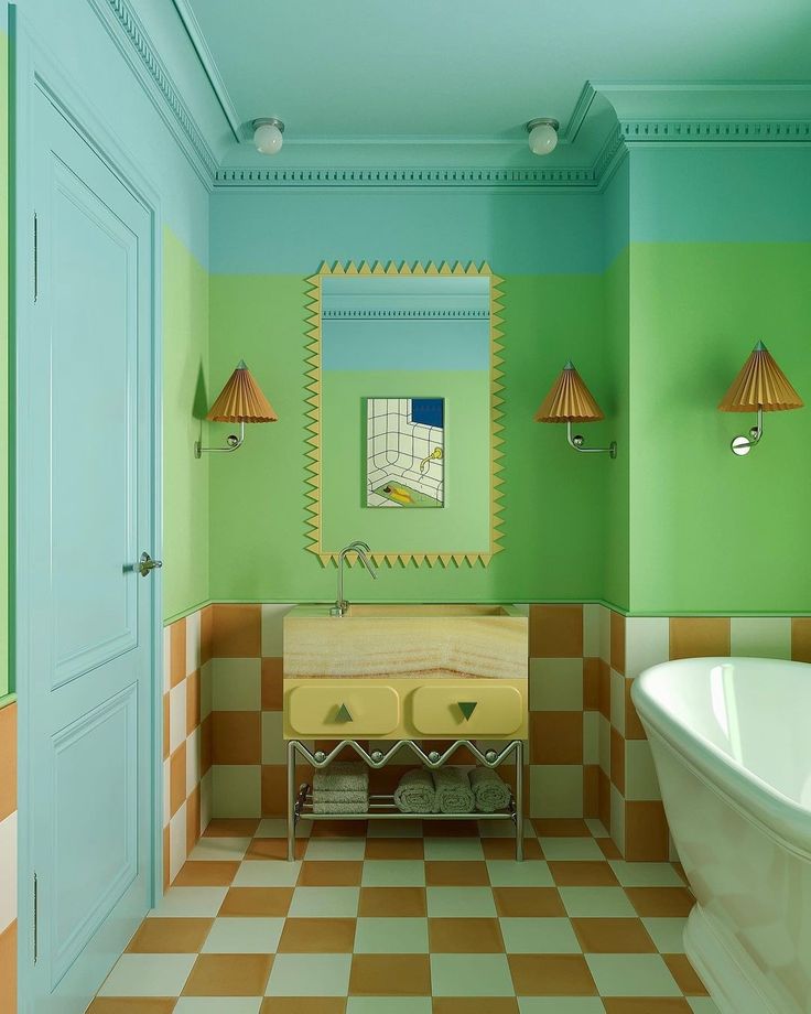 a bathroom with green walls and checkered flooring, two lamps on either side of the bathtub