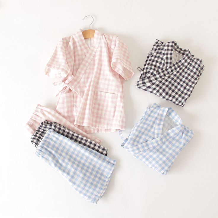 These gingham kimono kids pajamas are a fun and classy alternative to traditional nightwear. The top has a cross over top and the shorts are elastic waisted for comfort. Put your little one in their most comfortable state with this easy to wear item. Material: Cotton Cotton Gingham Loungewear Sets, Gingham Cotton Loungewear Sets, Spring Plaid Sleepwear, Gingham Sleepwear For Spring Bedtime, Spring Gingham Sleepwear For Bedtime, Gingham Sleepwear For Bedtime In Spring, Summer Gingham Sleepwear, Summer Gingham Sleepwear For Loungewear, Classy Alternative