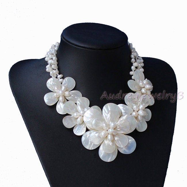 "Applications: wedding, engagement, daily wear,party Material: Natural Freshwater Pearl, shell beads size :5-6-8mm/0.196\"-0.23-0.31\" ,15*20mm /0.59*0.787\";20*30mm/0.787*1.18\" length:18inches (1\"=2.54cm=25.4mm,1cm = 0.39 inch). Color: As show We can adjust the length of your requirements This beautiful Necklace is the perfect addition to any wardrobe. This versatile necklace can be worn with just about everything. All the product are designed and made by myself so if you want any adjustments Gift Friend, Ocean Inspired, Wedding Necklaces, Pearl Shell, Ocean Inspiration, Shell Beads, Beautiful Necklace, Flower Necklace, Wedding Necklace