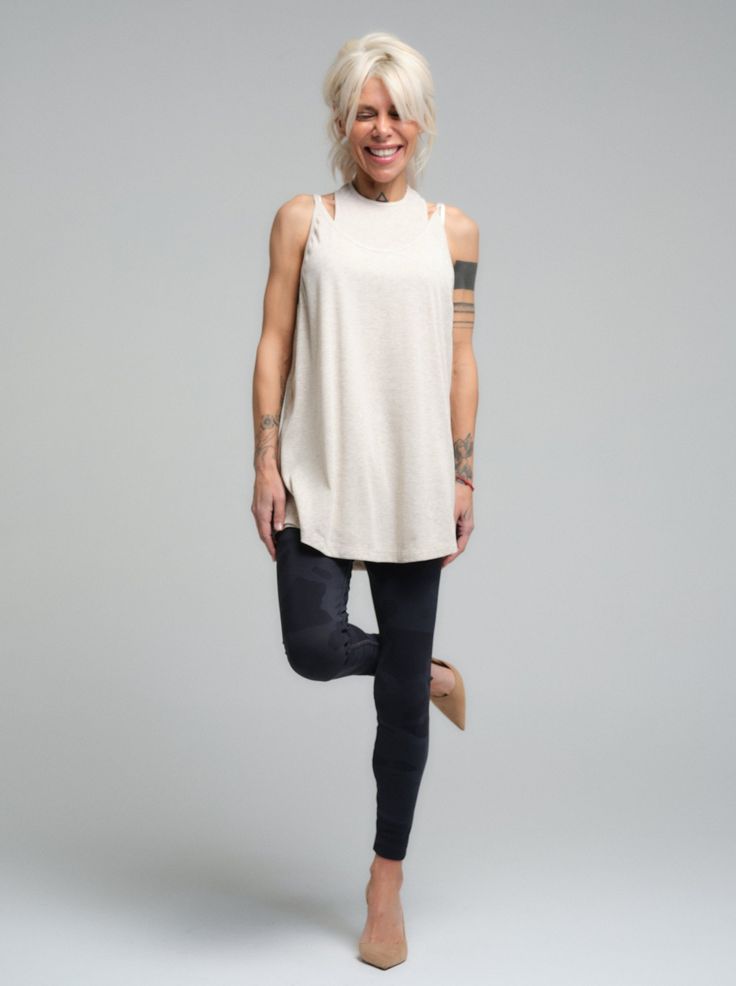 This lightweight, versatile top is a staple for any wardrobe. Crafted from a soft viscose material, it provides a comfortable, relaxed fit that's perfect for everyday wear. Its timeless design ensures it can be paired with anything from casual leggings to a tailored blazer for a smart-casual look. FEATURES:Classic, minimalist style with a modern twist. Offers a relaxed, flowing fit for all-day comfort.Easy to dress up or down for various occasions.100% Handmade. SIZE & FIT: Fit: A relaxed fit with room to moveModel is wearing size Small or S/M View our SIZE CHART before ordering MATERIALS & CARE: Content: Viscose Care: Machine wash on cold (30ºC) with a mild detergent. SHIPPING: Made to order, processing time is 15 working days This item will be shipped via DHL Camouflage Leggings, Camouflage Design, Casual Leggings, Skirt Jumpsuit, Tailored Blazer, Leggings Casual, Minimalist Style, Smart Casual, Jacket Outfits