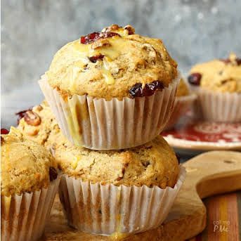 several muffins stacked on top of each other with cranberry sauce in the middle