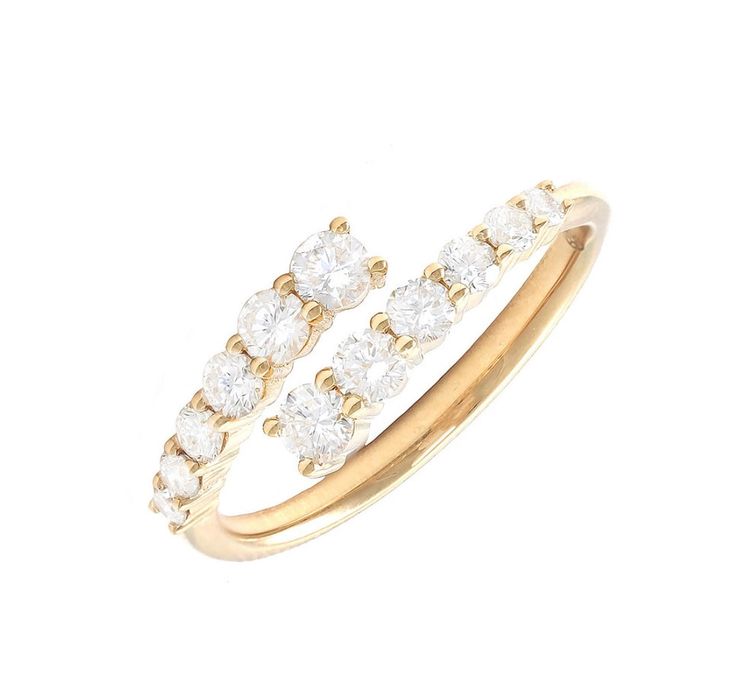 A GC favorite, this Graduated Open Wrap Diamond Ring features 12 graduated natural diamonds. Dazzling and modern, the Graduated Open Wrap Diamond Ring is a striking piece of fine jewelry designed to captivate. Featuring 0.64 carats of natural diamonds, this ring showcases a unique open wrap design with graduated diamonds that gracefully curve around your finger. The sparkling stones are set in solid 18k gold, adding a touch of luxury and sophistication to any look. Perfect for those who love bol Baguette Diamond, Ring Bracelet, Shop Necklaces, Round Diamonds, Ring Earrings, Natural Diamonds, Gold Diamond, Necklaces Bracelets, Diamond Ring